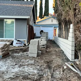 a man standing in front of a house