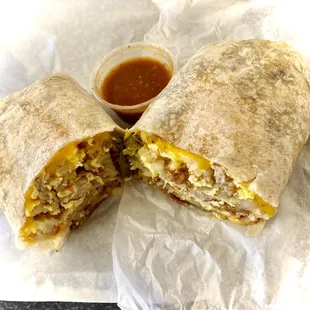 Breakfast burrito W/ Bacon, sausage, eggs, cheese, hashbrowns &amp; fiery jalapeños. Nice.