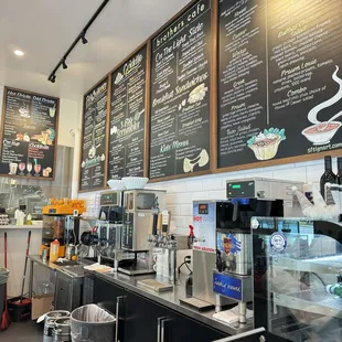 Their wall menu and front desk