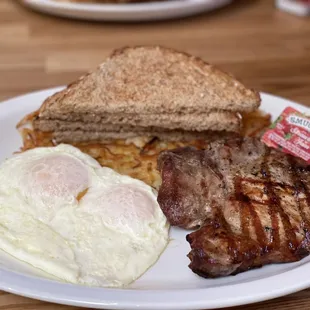 Pork chop and two eggs