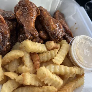 Peggy&apos;s Honey chicken with a side of Peggy&apos;s Parmesan Garlic