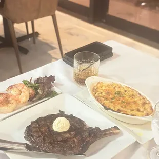 Ribeye steak, grilled jumbo steak, Mac-n-Cheese w/ double Jack and Coke.