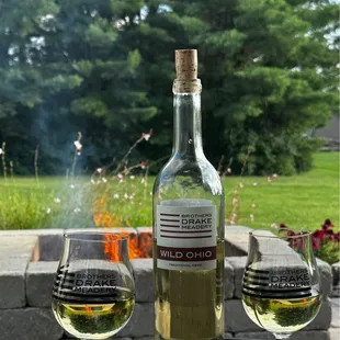 two glasses of wine on a table