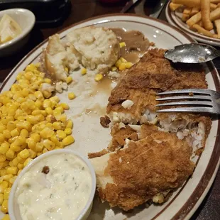 Barely acceptable cooked catfish...powder mashed potatoes???? Corn looks like it just hopped out of a can Cat Fish