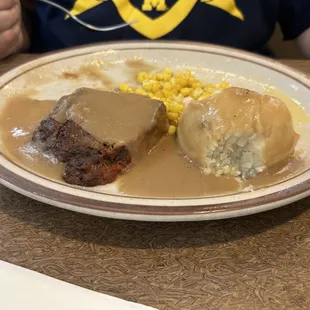 Homemade Meatloaf with mashed potatoes and corn. Came with a salad