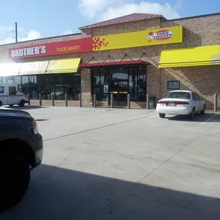 a car parked in front of the store