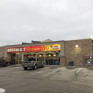 a truck parked in front of the store