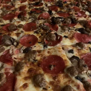 20&quot; with pepperoni, Italian sausage, and mushrooms