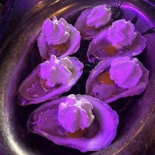 Raw oysters with mango mignonette and cracker foam