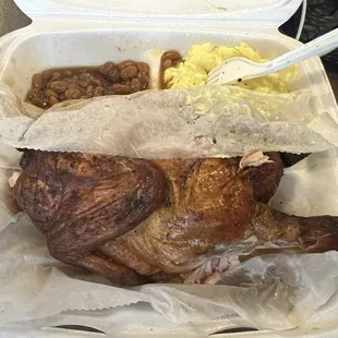 Half chicken with beans and potatoes salad.