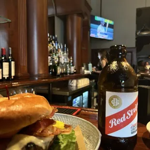 Burger, fries, and Red Stripe!