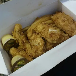 a box of fried chicken and pickles