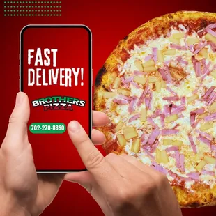 a person holding a phone with a pizza on it