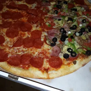 Large pizza.  Half pepperoni half delux