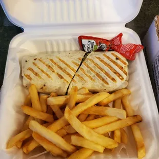 Steak and cheese wrap with grilled onions and mushrooms.