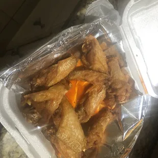 Wings basically sauceless.