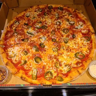Extra pepperoni and jalapenos!  Delicious!