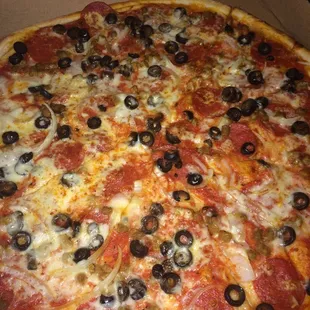 Custom . Pepperoni, sausage, onion and black olives