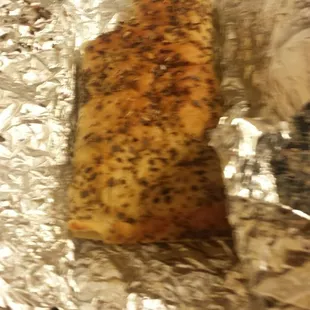 a piece of bread wrapped in tin foil