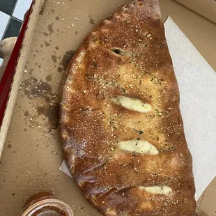 Medium calzone filled with mushroom and garlic