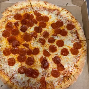 a pepperoni pizza in a box