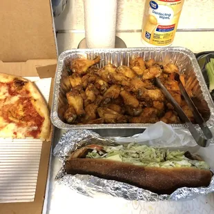 a hot dog, french fries, and pizza