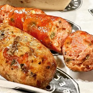 two sausages on a plate