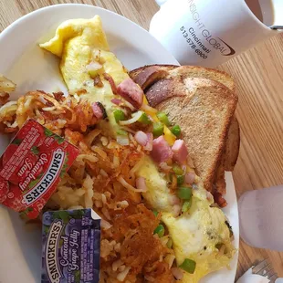 Country omelet with hashbrowns, well done, and wheat toast.
