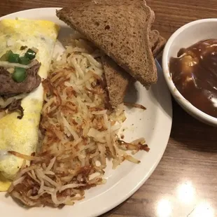 Philly cheese steak omelette with hash browns; side of mashed potatoes
