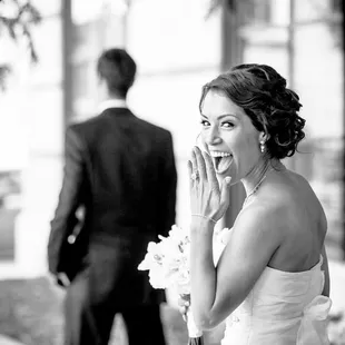 An adorable photo we caught of this Bride right before her first look.