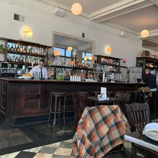a bar with a checkered table cloth