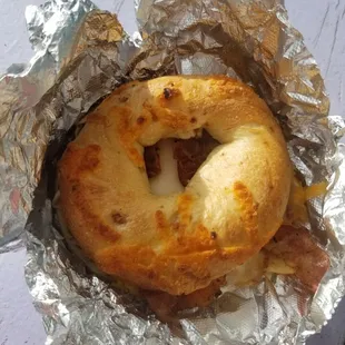 a bagel wrapped in foil