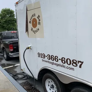 a delivery truck parked in a parking lot