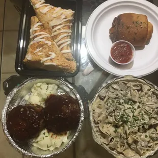 Yummy stuffed meatloaf, savory stroganoff, puffy pizza roll with homemade marinara and light and fluffy turnovers