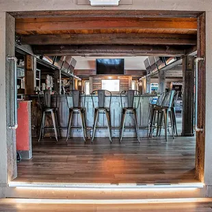 Though our spacious restaurant and bar span more than 5,000 square feet--we want our guests to feel like they&apos;re home in a rel...