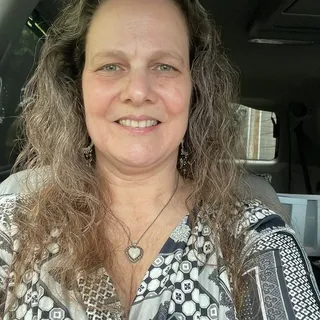 Gina T.