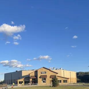 a building with a blue sky in the background