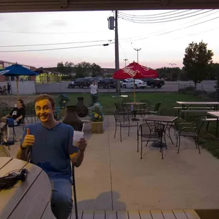 view of outside patio  and bar