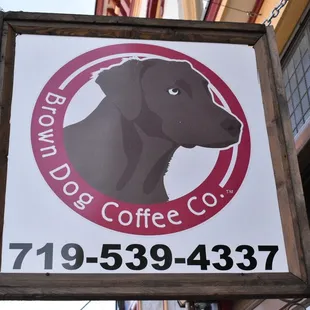 a sign for a coffee shop