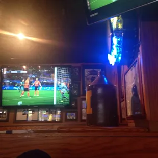a soccer game on a tv screen