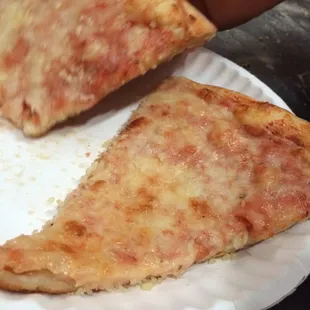Back room crap. One dollar medium pizza light cheese slices. Makin a joke of customers.