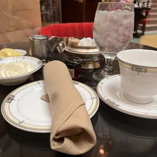 Table with Devonshire and lemon curd