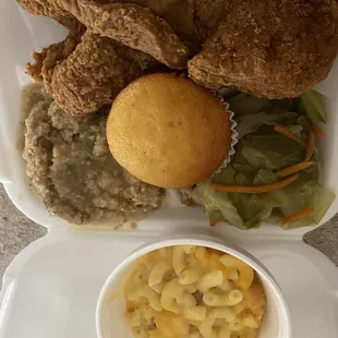 Fried pork chop dinner cabbage, dressing and Mac and cheese