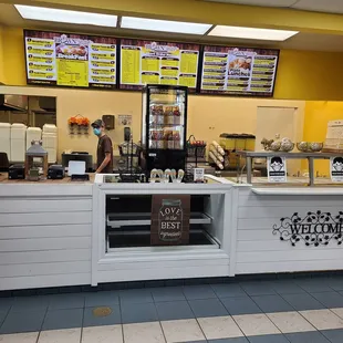 a man working behind a counter