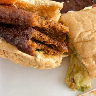 a sandwich with meat and coleslaw