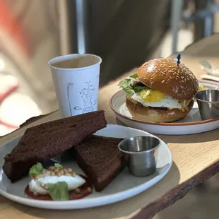 a plate of food and a cup of coffee