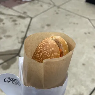 a sandwich in a paper bag