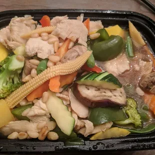 Lousy "pinenut chicken." The sauce had the consistency, and taste, of water. The vegetables were barely cooked.