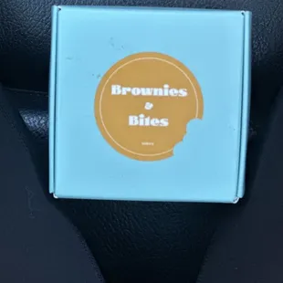 a blue box with a brownie on it