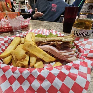Half of the Club Sandwich ( other half is in front of muh wife ) lil Modelo peeking out in the background.